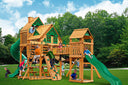 Cedar swing set with treehouse roof, wave slide and climbing wall, children playing on a lawn