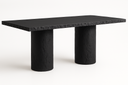 Arteriors Gemini outdoor dining table in matte carbon concrete, three-quarter angle view