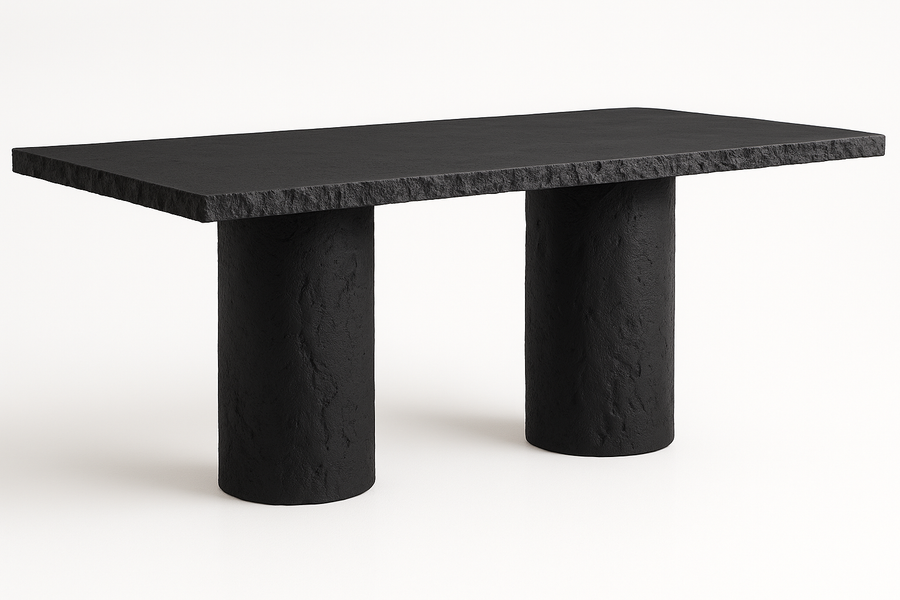 Arteriors Gemini outdoor dining table in matte carbon concrete, three-quarter angle view