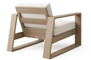 Ebel Novara lounge chair, natural frame, rear angled view showing slatted back