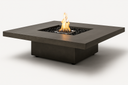 EcoSmart Vertigo 40 square concrete gas fire table with lit flame and black lava rock, angled view