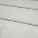 Loop rug tufted white geometric arches closeup