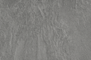 Close-up of the matte grey slate tabletop surface on the Mamagreen Aiko dining table