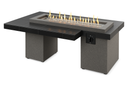 Uptown Linear gas fire pit table with flames lit over fire glass, angled view