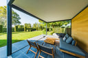 Renson Algarve rotating louvered roof beside a swimming pool