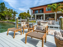 Royal Teak Collection Admiral Outdoor Teak and Synthetic Rope Accent Chair in Sand