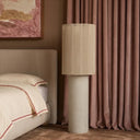 TOV Furniture Mondada Cream concrete floor lamp TOV-G19038 shown in a bedroom beside a bed