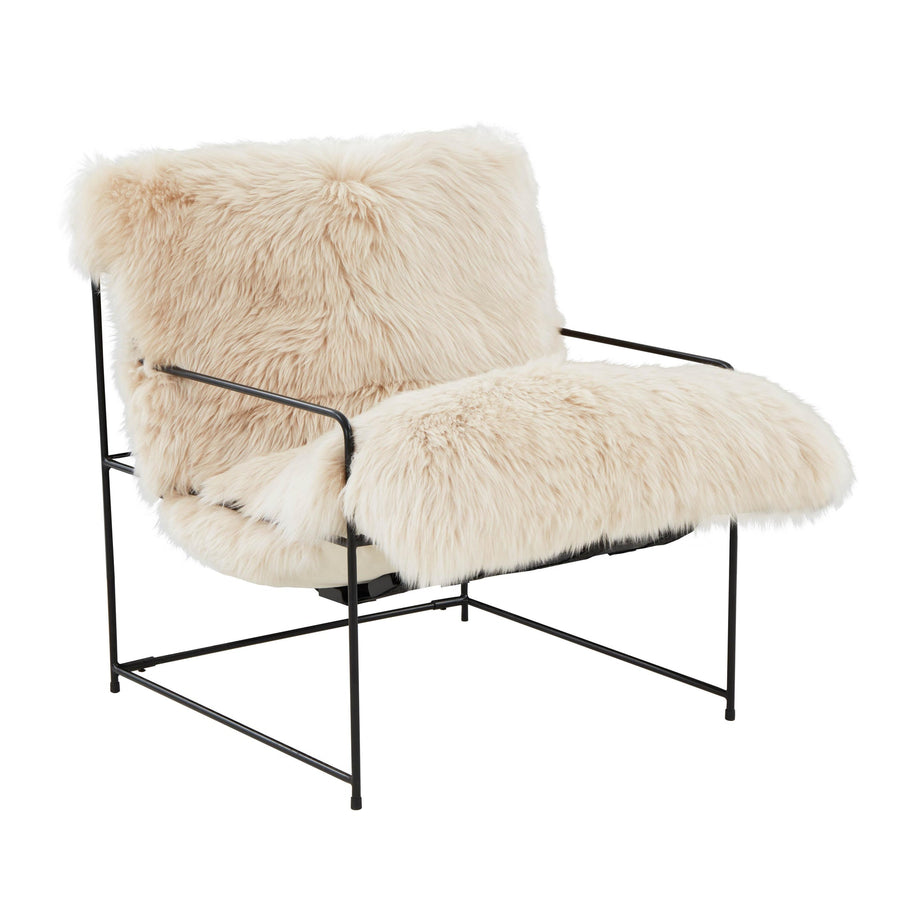 TOV Kimi natural genuine sheepskin accent chair on slim black iron frame