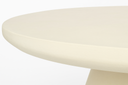 Detail of the softly rounded cast edge and rim on the Uttermost Madrone table top