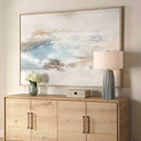 Chasing Blue by Uttermost, full artwork styled above a wood console