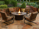 OW Lee Santorini 42 inch round fire table with four Classico spring base lounge chairs on a flagstone patio