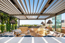 Camargue louvered pergola on a rooftop terrace
