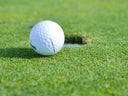 Golf ball on a putting green
