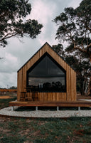 Timber cabin with glazed front
