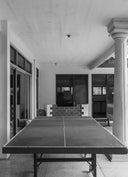 Table tennis on a covered terrace